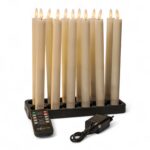 Een set van zes oplaadbare 97 mm warmwitte LED dinerkaarsen met een werkingsduur van 130 uur, afstandsbediening en oplaadbasis.